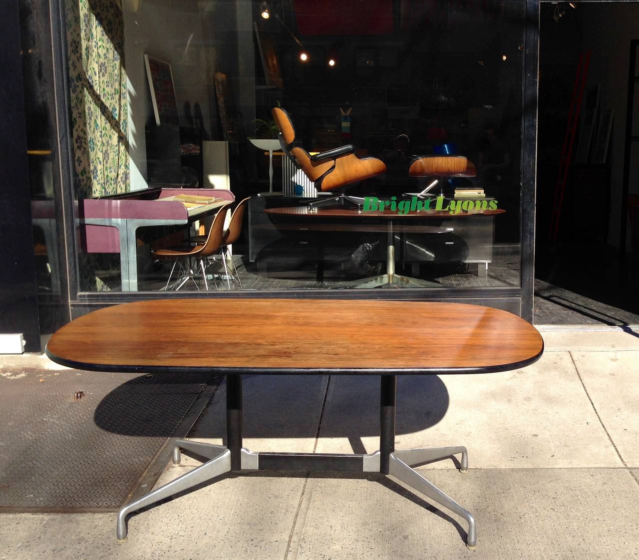 Segmented Base Rosewood Table designed by Charles & Ray Eames
for Herman Miller in 1964.