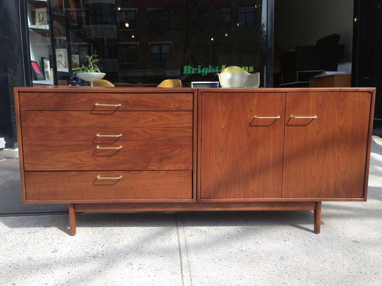 A walnut credenza designed by Jens Risom, 1960's for Risom Studios.