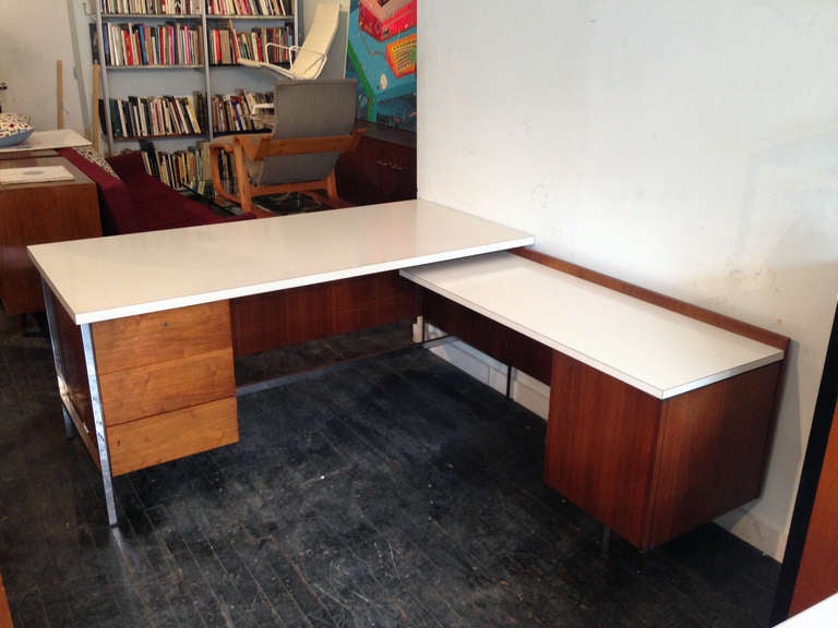 A handsome Executive Desk designed by Florence Knoll, circa 1960's. Laminate surface features a really hot grid pattern.