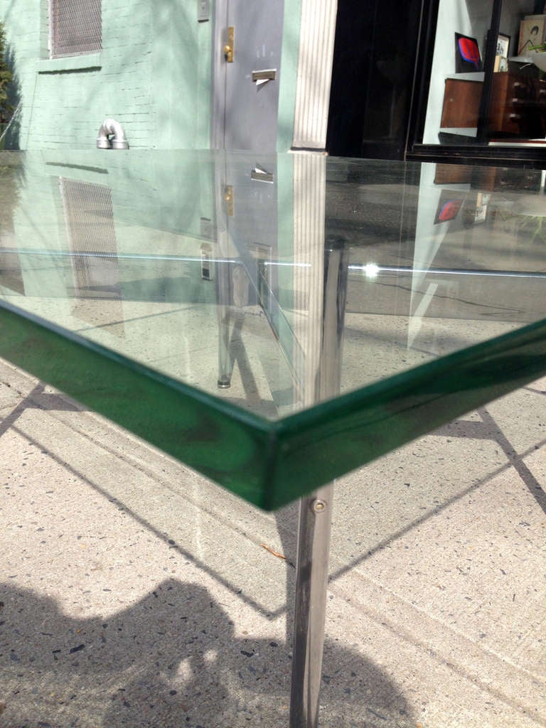 A Glass Cocktail Table by Laverne International, circa 1960's. In Good Condition In Brooklyn, NY