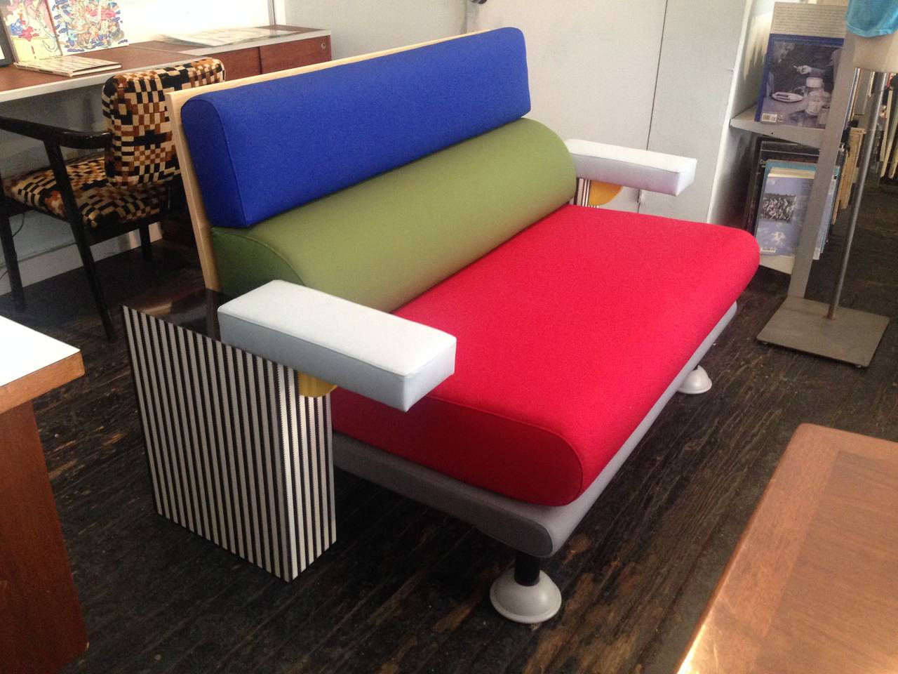 Lido settee by Michele De Lucchi for Memphis Milano1982.

wood, metal, wool, laminate