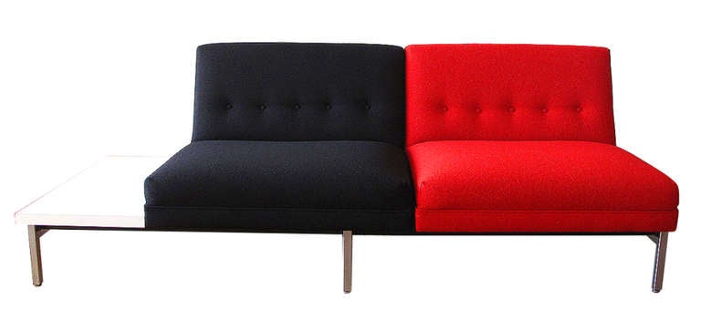 An early George Nelson modular settee with original custom black and red upholstery.
