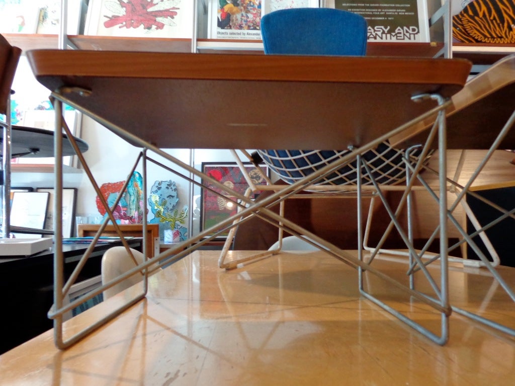 Pair of white LTR (Low Table Rod) side tables designed by Charles and Ray Eames for Herman Miller.