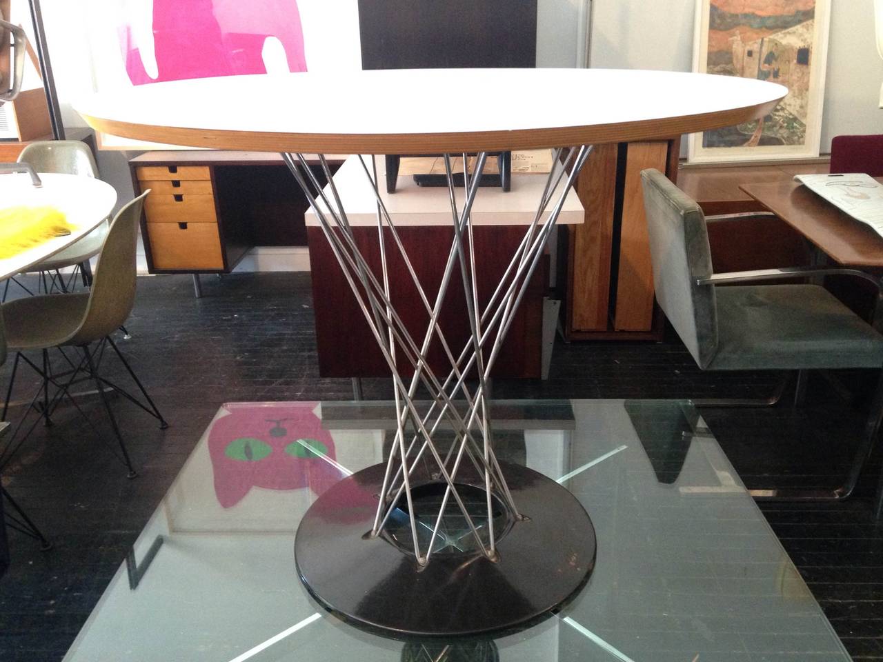 Cyclone Table designed by Isamu Noguchi for Knoll in 1955
White laminate top, steel wire column, cast Ironbase