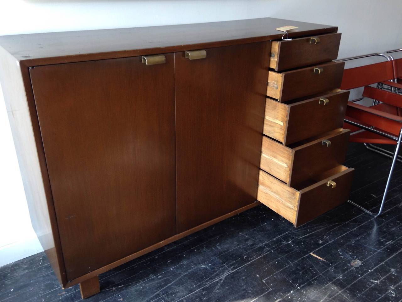 2 door walnut cabinet dresser with 2 shelfs designed by George Nelson for Herman Miller in 1948