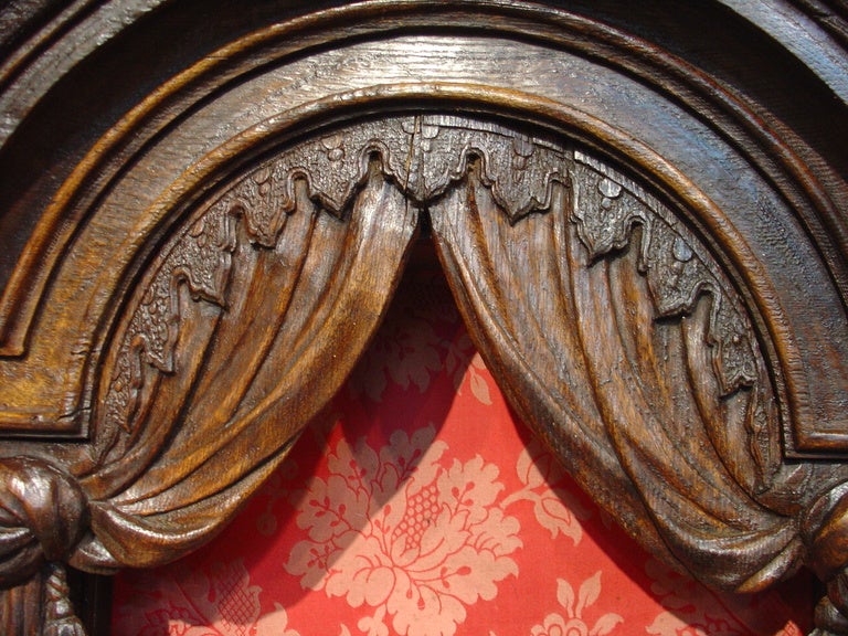 This antique French tabernacle has been hand carved from European Oak in the 1700’s.  Tabernacles were receptacles reserved for the Eucharist (wine and bread commemorating the life and blood of Christ).  Tabernacles generally would have been located