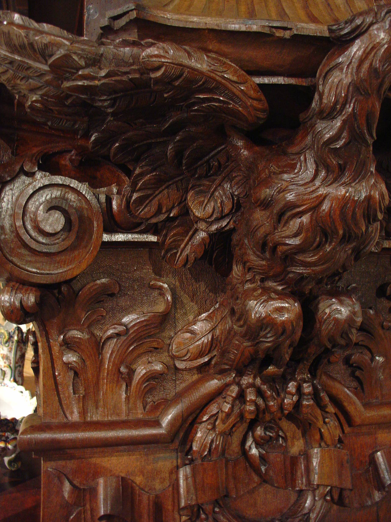 This extremely unique French architectural is carved from French oak and most likely served as a  stylized Ionic pilaster.  It has magnificent hand carved details on all of its motifs.  This pilaster/panel may have been in a boiserie (wooden paneled
