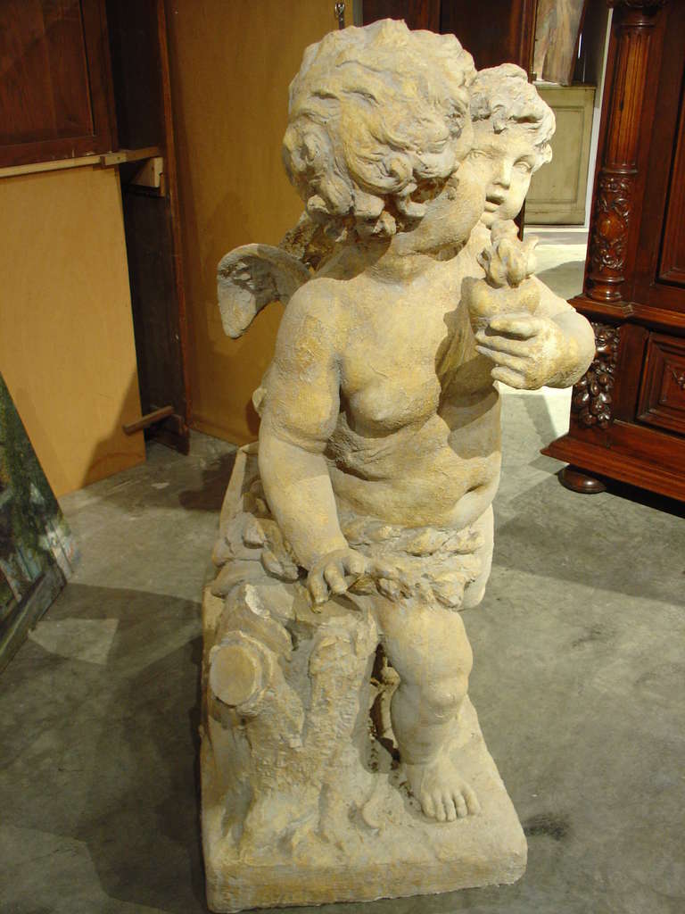 20th Century Re-Constituted Stone Cupids Statue from France