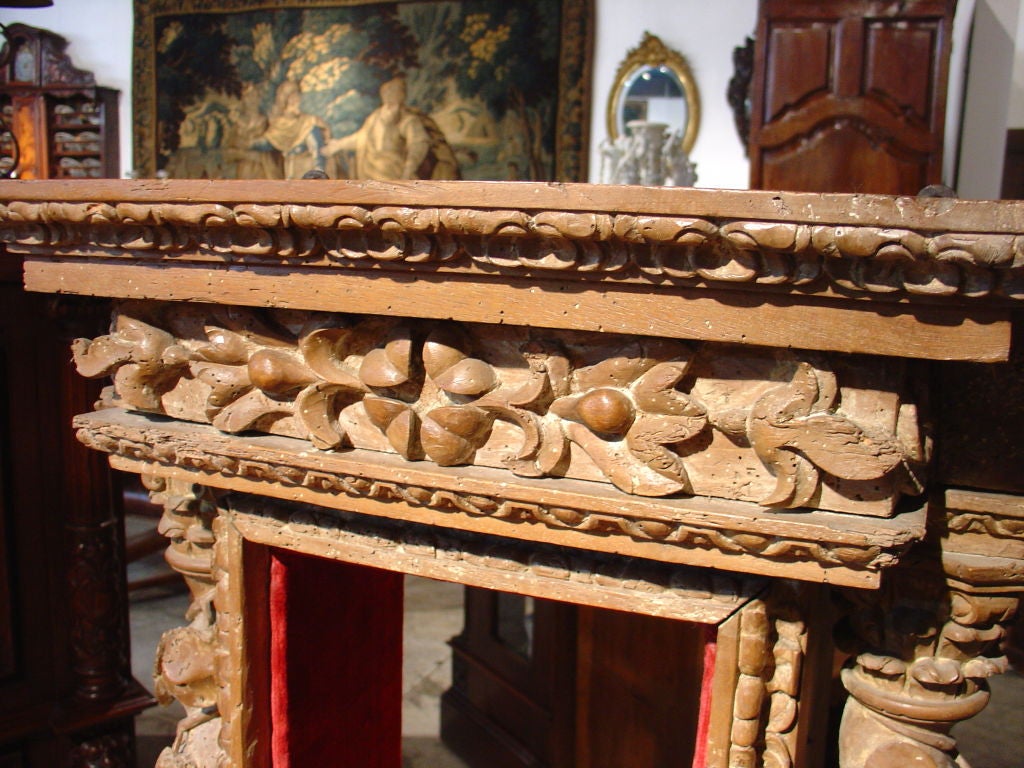 This beautiful antique French church tabernacle is from the 1700’s.  The European Oak has been stripped at some point in its history, with traces of gesso showing in the recesses of the ornamentation.  Red silk velvet covers the interior of the