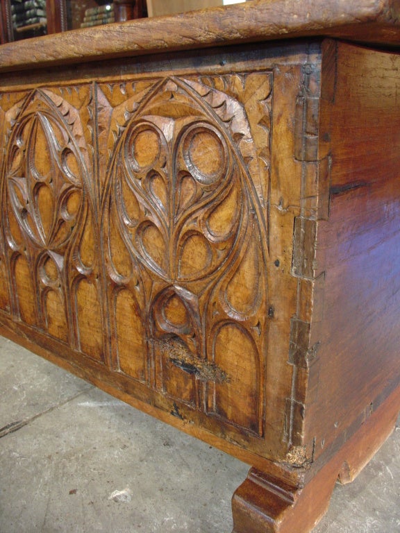 This antique French Gothic style trunk is the perfect size for a coffee table, at the end of a bed as a blanket holder, at the end of a hall with a mirror over it and many more uses.  Made in the early 1800’s of European oak, the front panel has