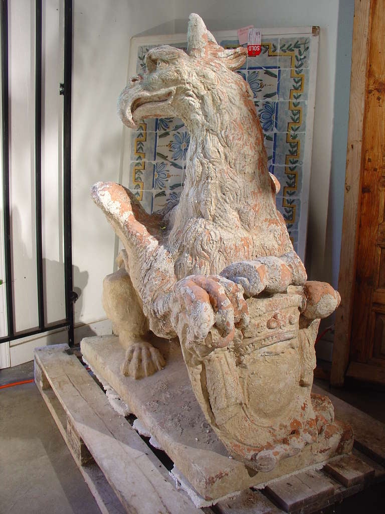 Pair of Patinated Griffin Statues from France
