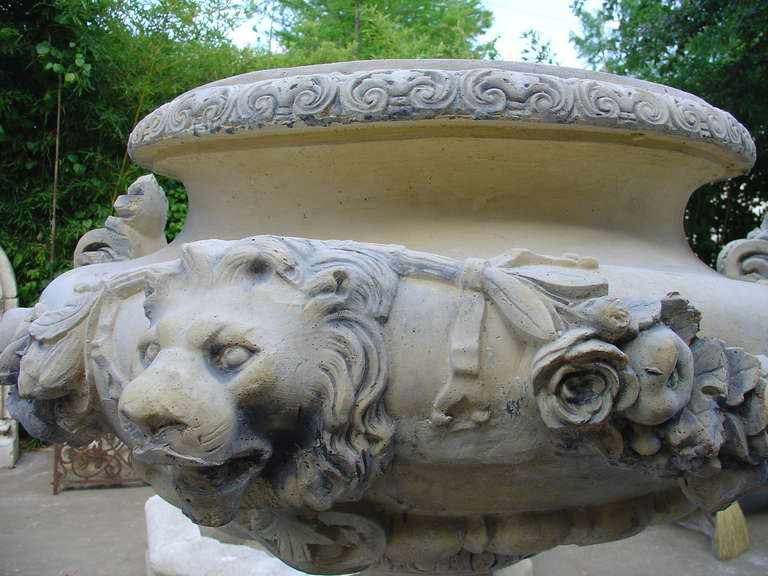 Contemporary Pair of French Lion Urns on Pedestals