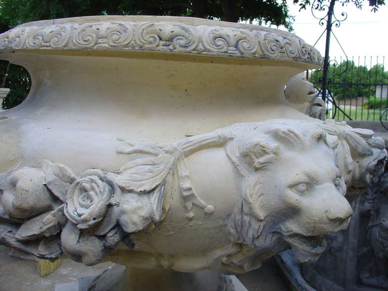 Cast Stone Pair of French Lion Urns on Pedestals