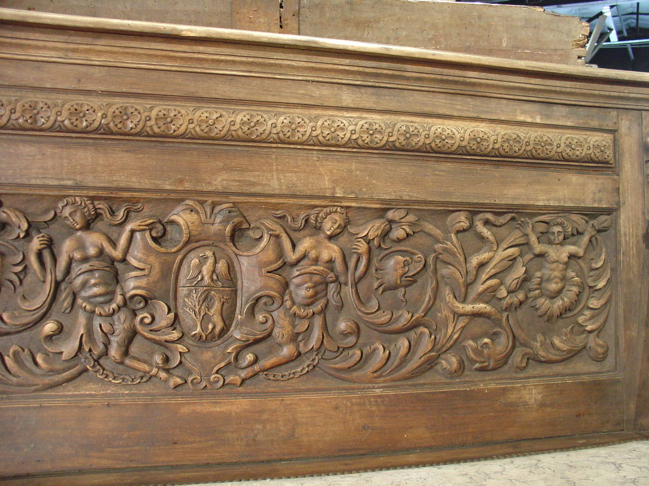 Cleaned French Oak

This comfortable antique French Renaissance style bench with a trunk in the seat has beautiful motifs typical of the Renaissance style.  On the bench’s back, there is scrolling foliage with demi figures, dolphins, and serpents,
