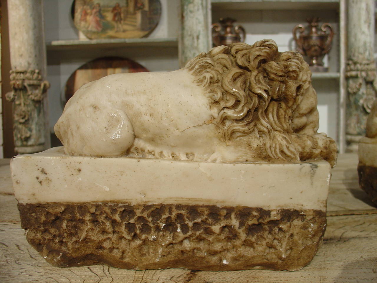 Italian A Pair of Hand Carved Marble Lions from Italy on Rectangular Plinths