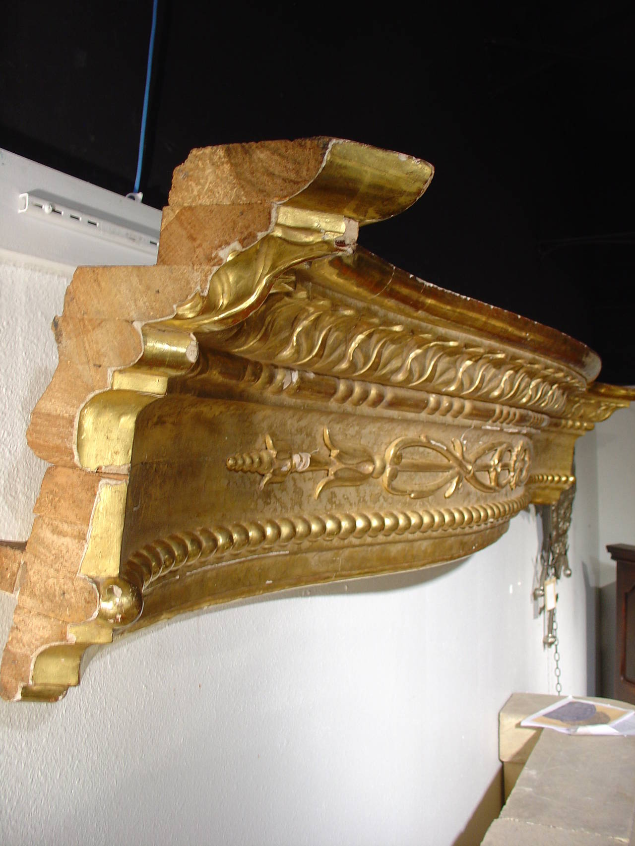 This large stunning giltwood valance from Sicily will absolutely be the focal point of any room it is displayed in. The carver of this valance depicted wonderful movement from all angles, almost as if it were a piece of sculpture. Also the matte and