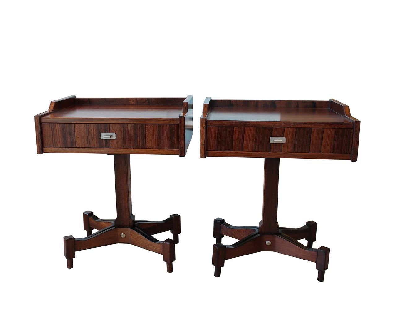 Pair of rosewood side tables with single drawer and nickelled metal handles by Claudio Salocchi.
Edited by Sormani.