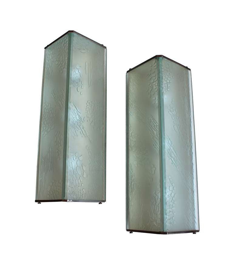 Rare pair of model no. 2051 wall lights by Max Ingrand for Fontana Arte.Steel oxidised brass with sanded glass screens.