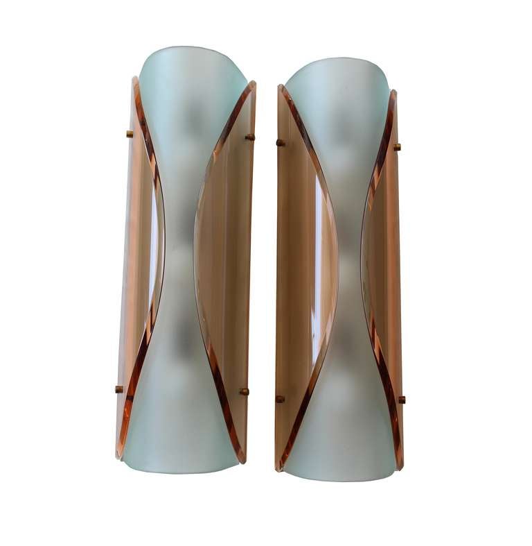 Pair of wall lights in coloured and sanded glass with enamelled metal mounts.Model no. 2188