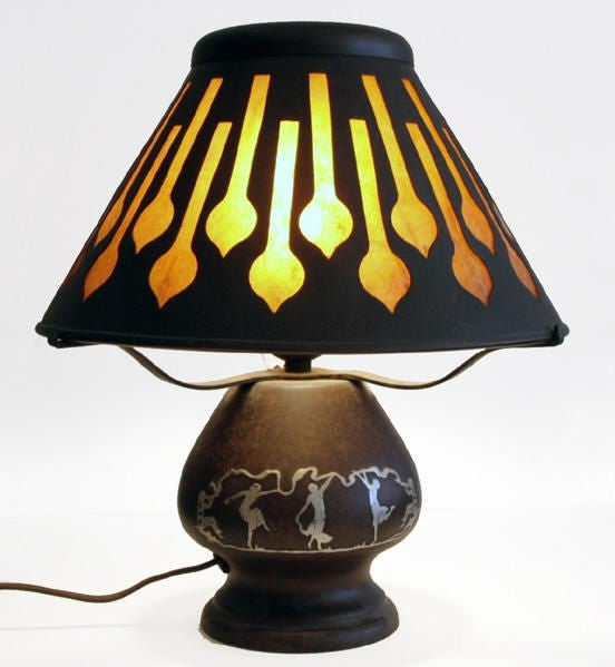 Base of lamp features sterling overlay front and back of three graces frolicking between 
