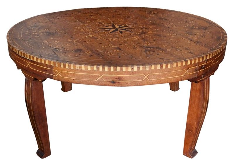 Inlaid from various woods.<br />
Coffee Wooden table from Essaouira, Morocco.<br />
The specialty of the Essaouira region is its celebrated work in the dappled wood of the Tuya tree, polished and inlaid with motifs in lemon-wood.<br />
<br