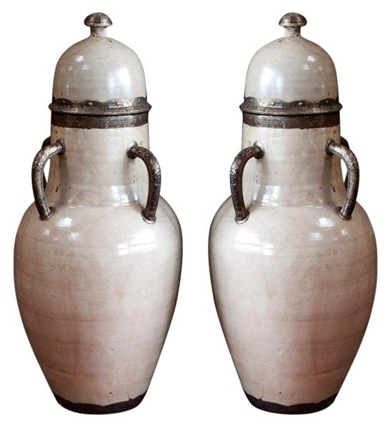 Set of two ivory color handcrafted olives jars with lid.
Hand-made in Fez Morocco.
Incredible crackle antique ivory color with handles covered with nickel silver.
Very elegant Moroccan ceramic urns or large vases will suit any Moorish style or