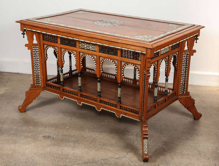 Antique 19th century Syrian Moorish Middle Eastern console table.
Rare console table with Moorish arches inlaid with ebony and bone.
Carlo Bugatti style.
Measures: Size of the top is 30" x 46" H x 32" height.
Bottom with legs getting