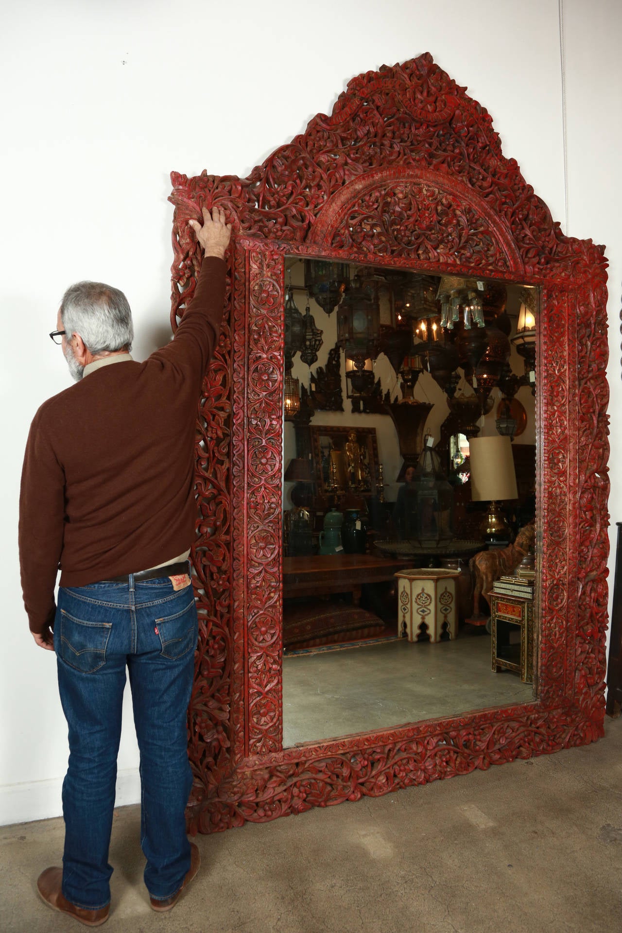 9' 8 giant Anglo-Indian mirror.
Mogul era heavily and finely hand-carved with floral design, amazing craftsmanship on frame mirror.
Taj Mahal style, Rajasthani work on wood, Moroccan style Mirror.

Very heavy, the mirror has multiple scratches