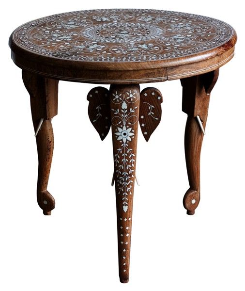Elegant round side table delicately handcrafted and inlaid with mother of pearl. Floral inlay designs and elephant head on the three legs.<br />
<br />
Moorish, Spanish, African, Islamic Art, Arabian, Middle Eastern, Egyptian,Turkish, Syrian