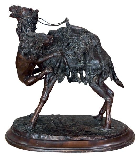 Beautiful Arabian orientalist artwork of a Moroccan camel that is being attacked by a ferocious lion.
The patina finish is stunning in its deep, rich tones.
Stamped with French sculptor signature: P.J. Mene Orientalist, Animalier(1810-1879)
Bronze