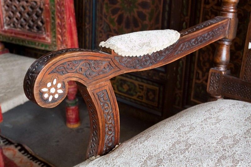 Unique, elegant Comfortable, very stylish Syrian sofa.<br />
Hand-carved Syrian settee with mother of pearl inlay on solid walnut and fine carvings with details of Arabesque designs and moucharabie. The three crowns with star-shaped head part are
