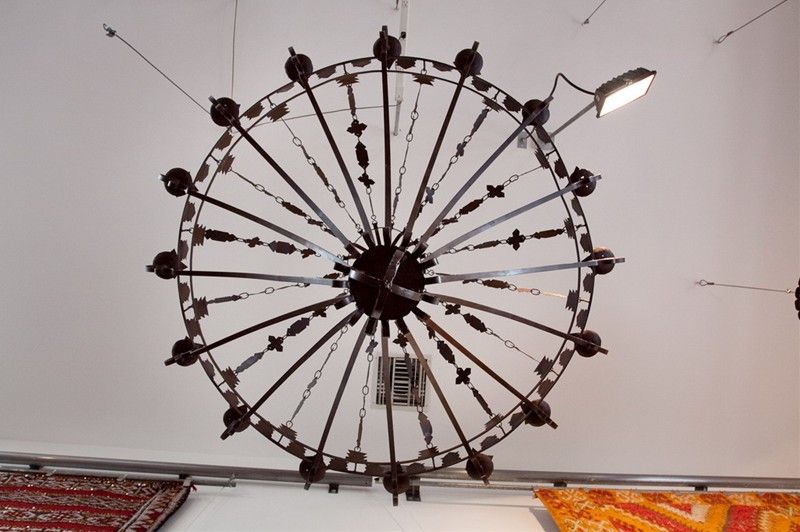 6-feet wrought iron 16 candle cups Moorish French Revival cage-style chandelier, hand-forged for use with candles, there is no electrical wiring, Very good original condition.
Great for use outdoor or indoor.


