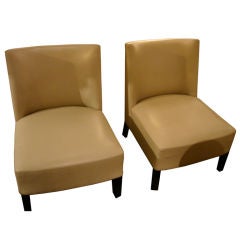 Pair of leather armchairs by Christian Liaigre
