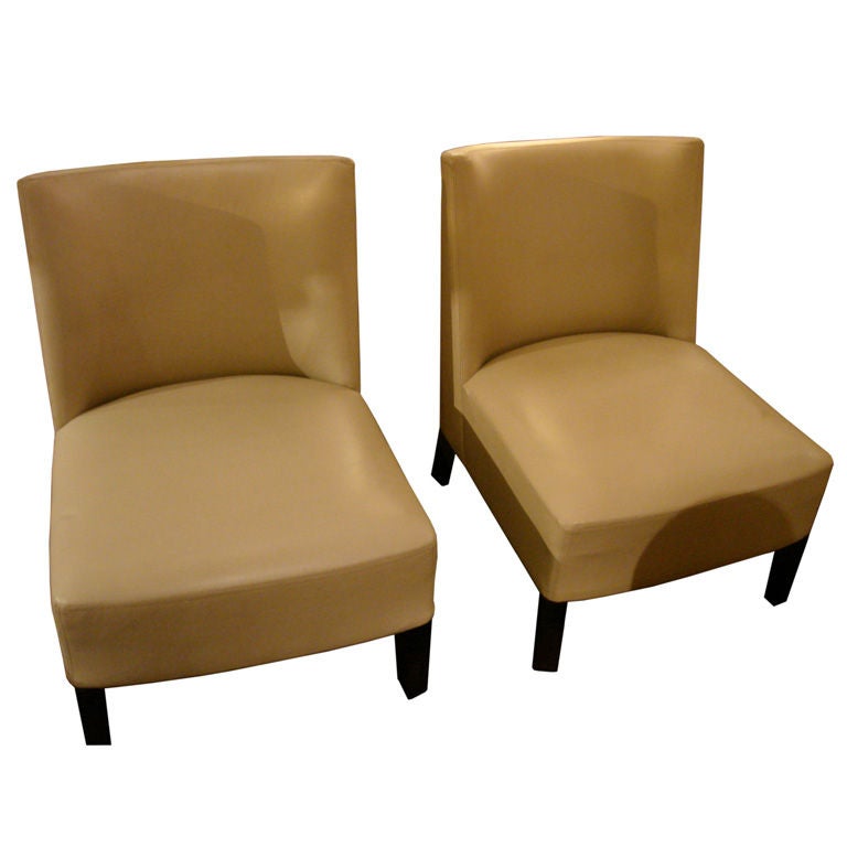 Pair of leather armchairs by Christian Liaigre
