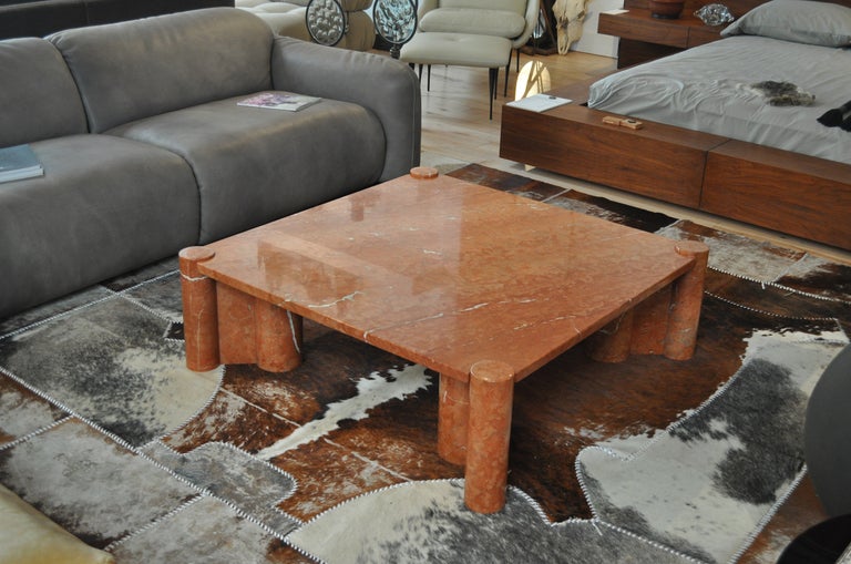 Extraordinary Jumbo marble coffee table by Gae Aulenti.  The top has beautiful natural veining  throughout and sits on four solid sculpted marble legs.