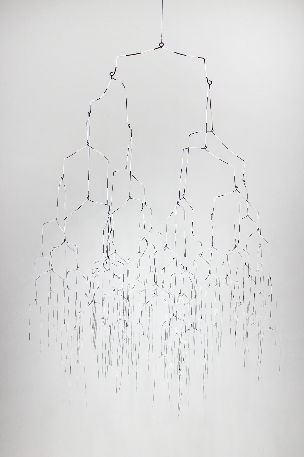 Beth Campbell, There's No Such Thing As A Good Decision, Paint on Oxidized Steel. Her hanging mobiles have a delicacy and gravity that become increasingly compelling as you notice their subtle movement. They are composed of steel wire of various