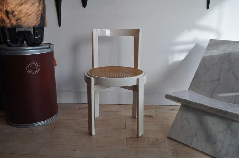 Exquisite Bauhaus styled Italian chair in white lacquer and cane seating.