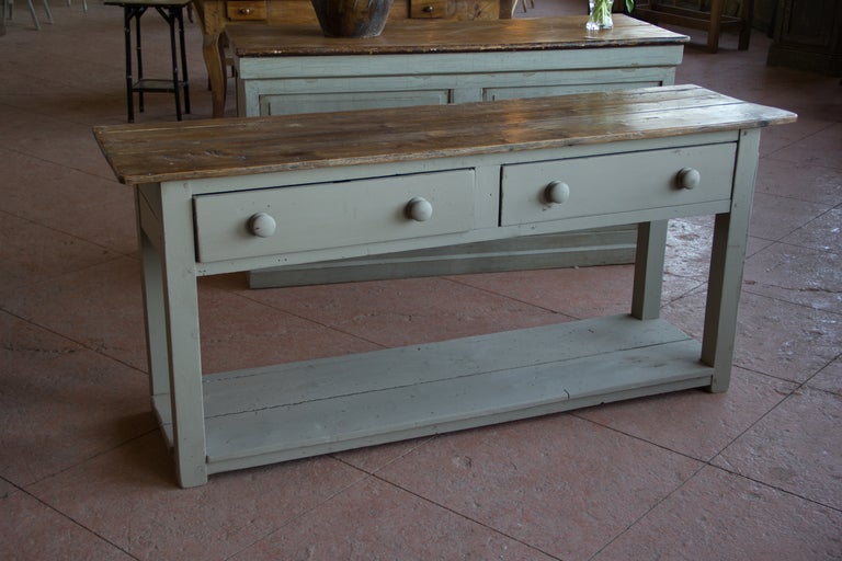 Lovely antique Irish country pine 2 drawer serving table with pot shelf stretcher.  More recent paint finish finish.