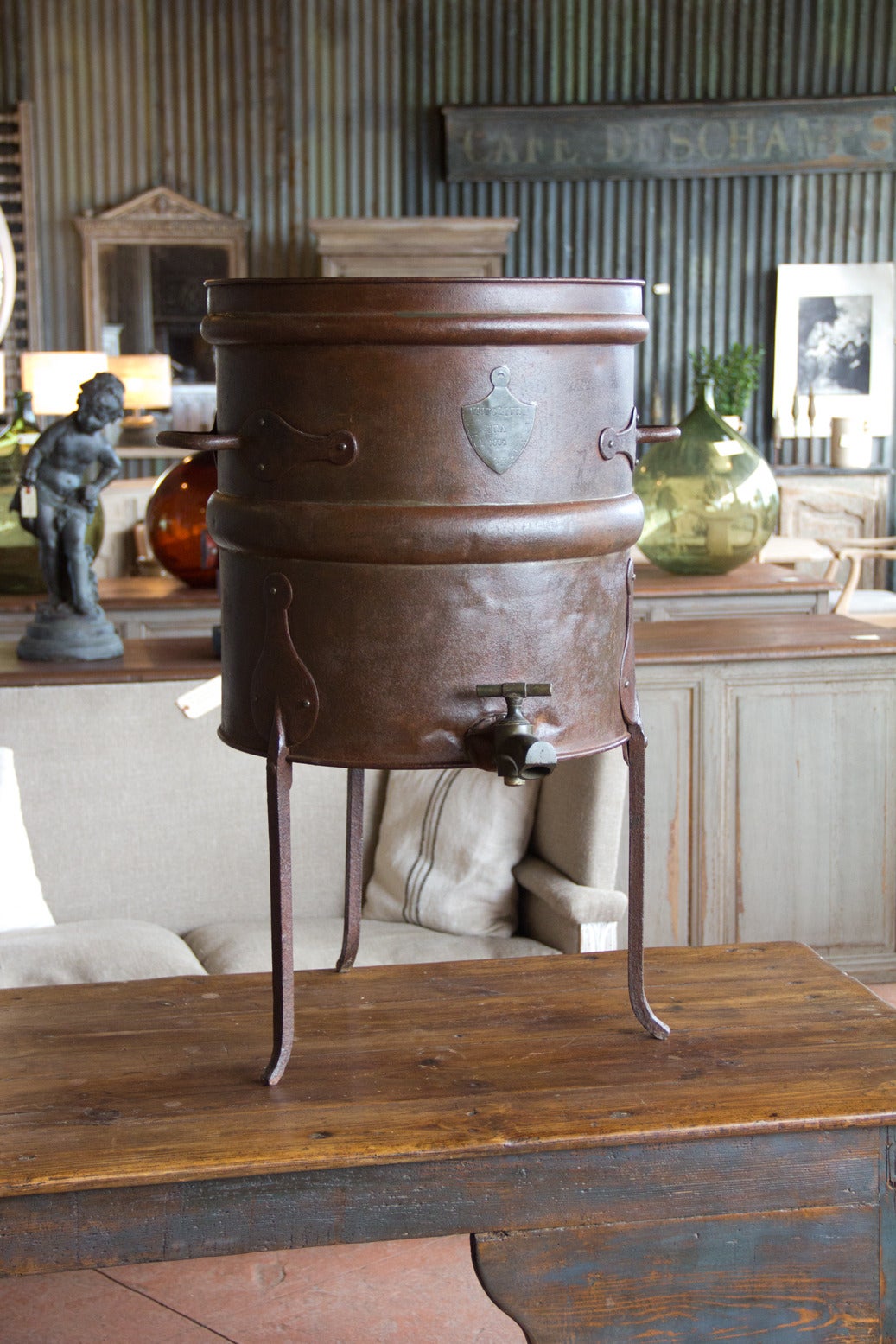 Rare antique tole and iron hectoliter wine measure with spigot, on a Stand with maker's mark and date. It was used to measure up to 100 liters of wine from the barrel, Jura, France.

We do have one more available. Please contact us if you would
