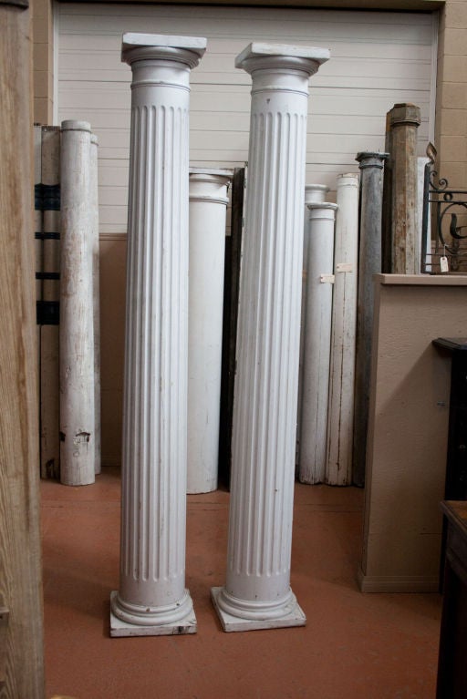 Fabulous pair of 19th century fluted painted wooden Doric columns with slightly tapered shafts from Pennsylvania.