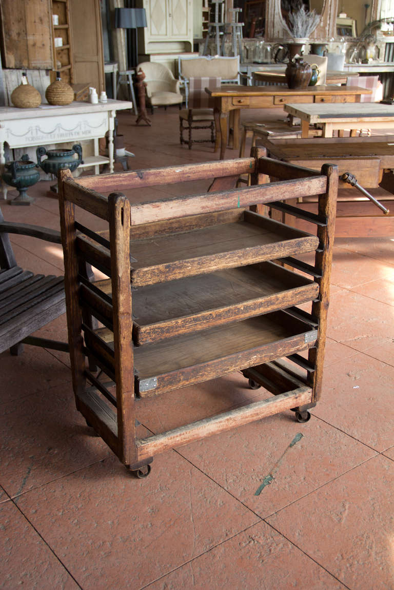 Wonderfully authentic 19th century English baker's bread rack and 3 trays on it's original casters.  