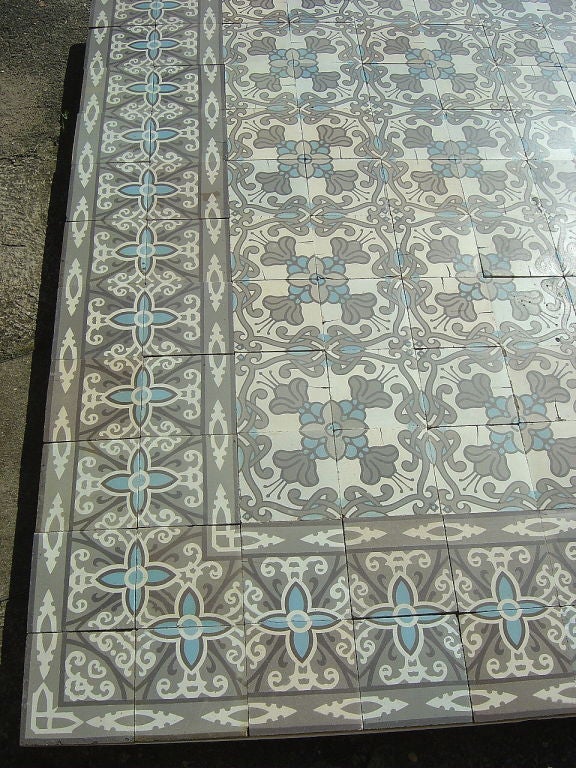 A beautiful example of an early Belgian Art Nouveau unglazed ceramic encaustic floor produced by Maufroid Freres et Soeur c.1902, recovered from a house in Gembloux in Belgium.<br />
 <br />
Both the main field tile and the double lay border tile