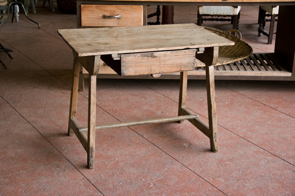 Beautiful antique rustic English bailiff's table with single centre drawer.