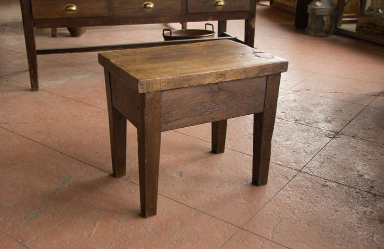 Substantial antique beechwood farmhouse kitchen preparation table, from Burgundy, France.  (At some time during its history, it was reduced in height).