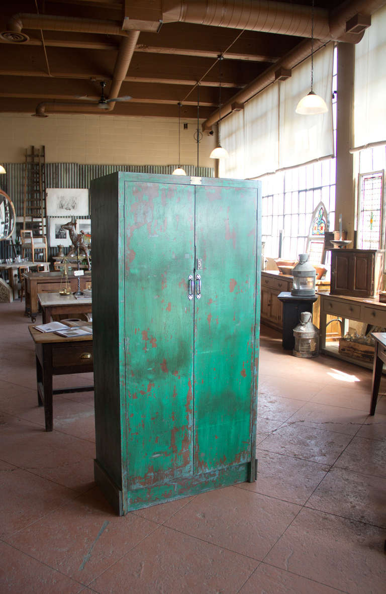Vintage industrial original painted 28 pigeon hole cupboard from a Yorkshire mill, UK. Makes great storage for wine bottles!