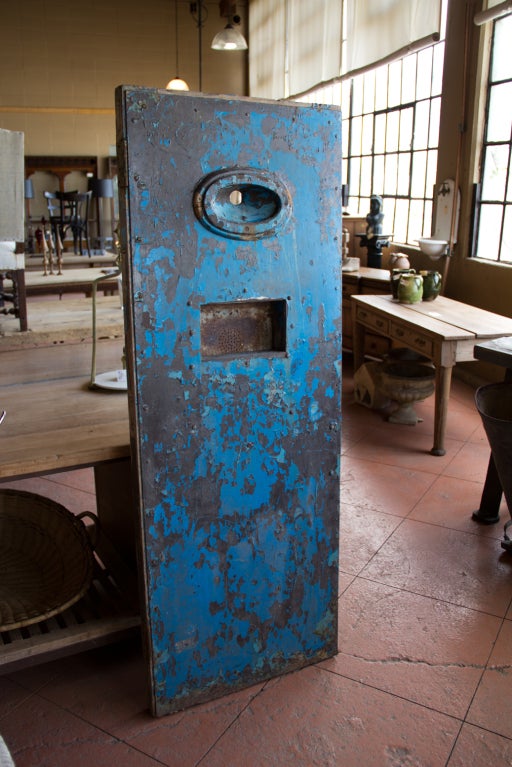 This is for those who love the macabre.  Our English prison door is certainly a conversation piece. Made of heavy steel and wood it has a food slot and peep hole. We have left its original paint on but we could strip and polish for an additional