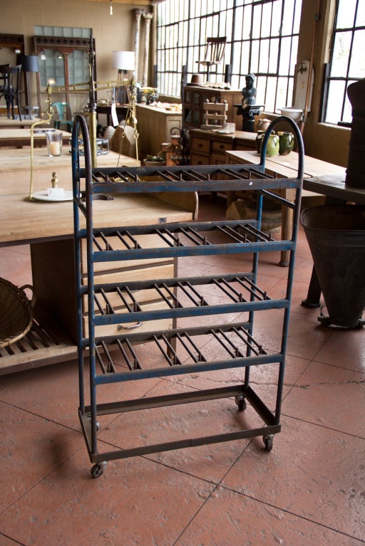 Heavy vintage Industrial factory trolley with its original blue paint. Would work well in a restaurant or kitchen.