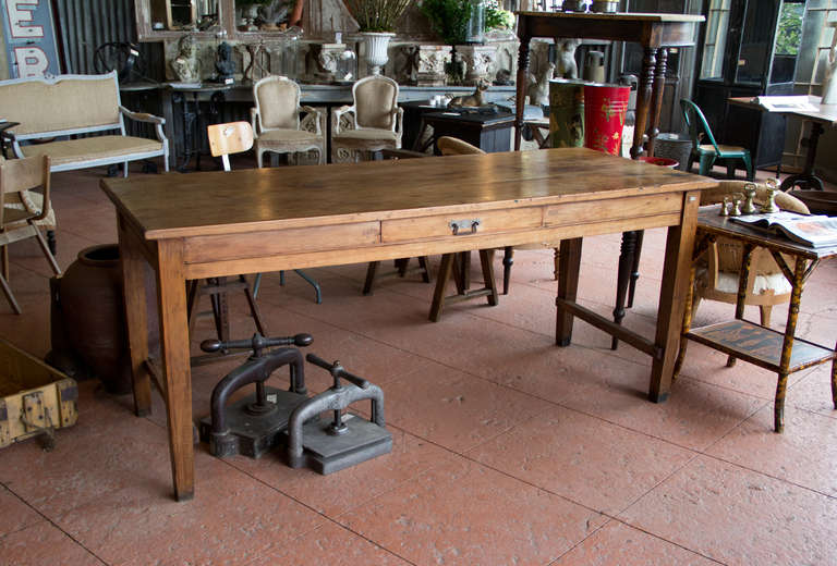 Large vintage oak library table from Chicago.  It has simple tapered legs and a single drawer to the front.  It has a great patina and would make a perfect kitchen island.