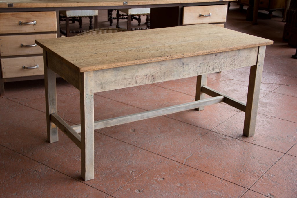 Fabulous pegged hardwood vintage table from the chemistry lab of a British school. We have lightly sanded them being careful to retain all the graffiti. We currently have two available at $750 each.