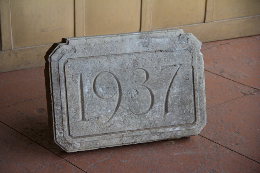 Beautifully patina'd bathstone plaque with the date 